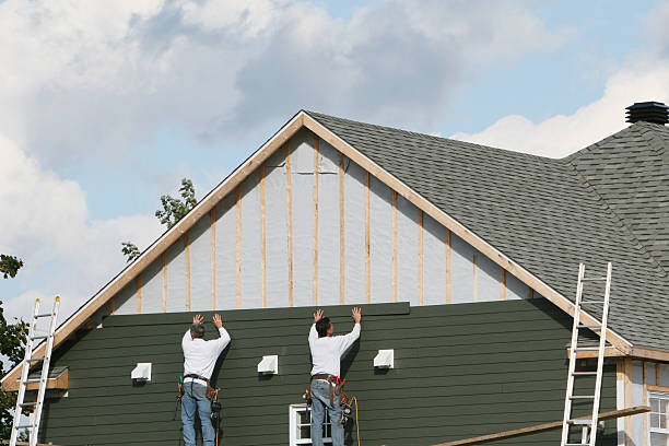 Professional Siding Installation technician working in Bellbrook, OH